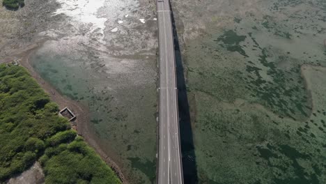 cebu cordova link expressway, pan up aerial over mactan