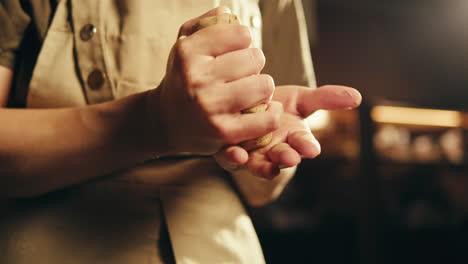 hands shaping clay