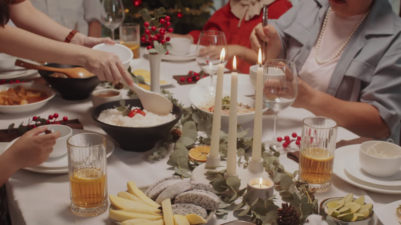 Family Celebrating Christmas at Table