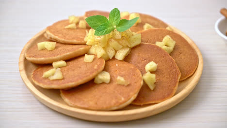 apple pancake or apple crepe with cinnamon powder