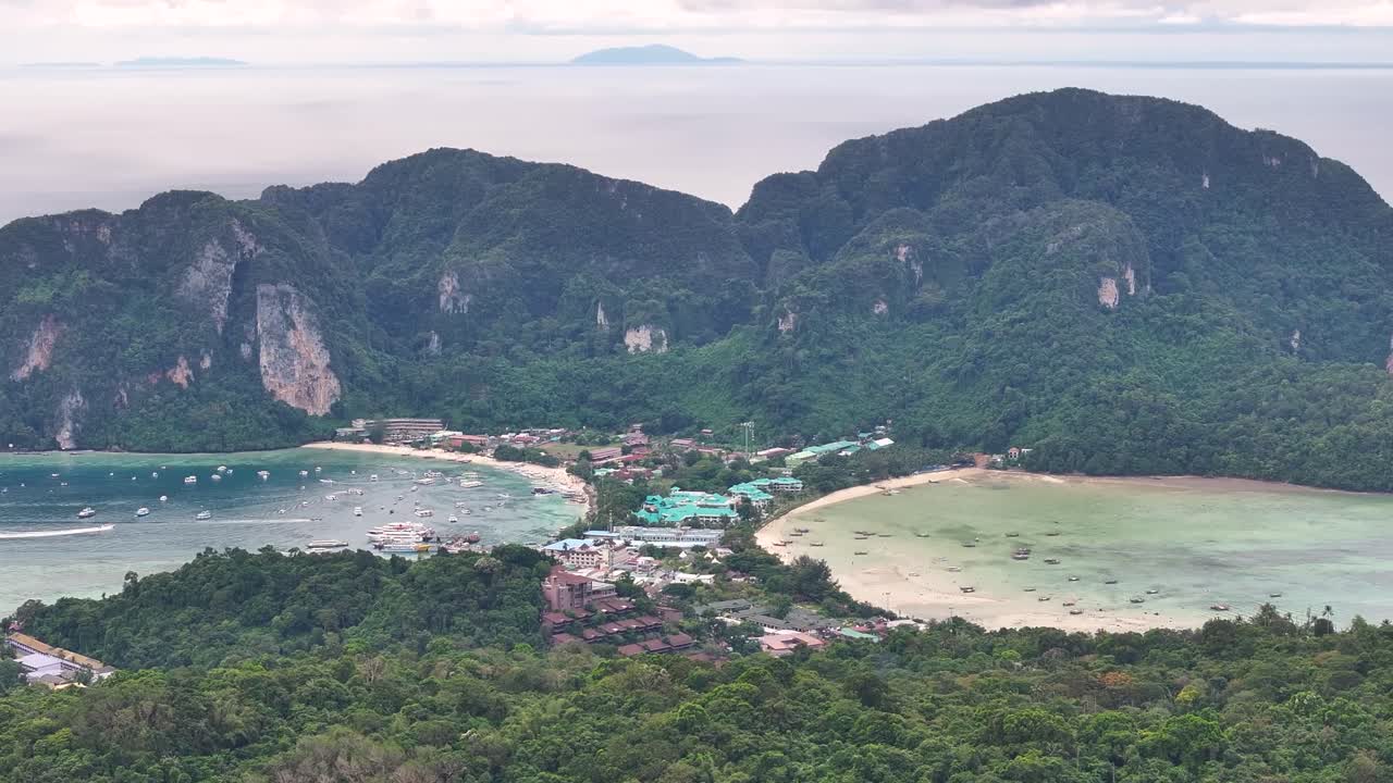 Aerial scenic of Koh Phi Phi Don island in Thailand. Thin strip with beaches and cliffy background.