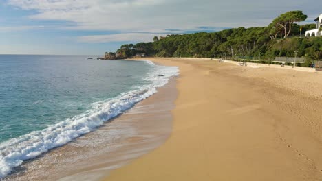 mediterranean beach paradisiaca turquoise blue waters no people aerial view drone spain catalunya costa brava blanes lloret de mar mallorca balearic islands