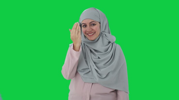 mujer de negocios musulmana feliz haciendo pantalla verde adaab