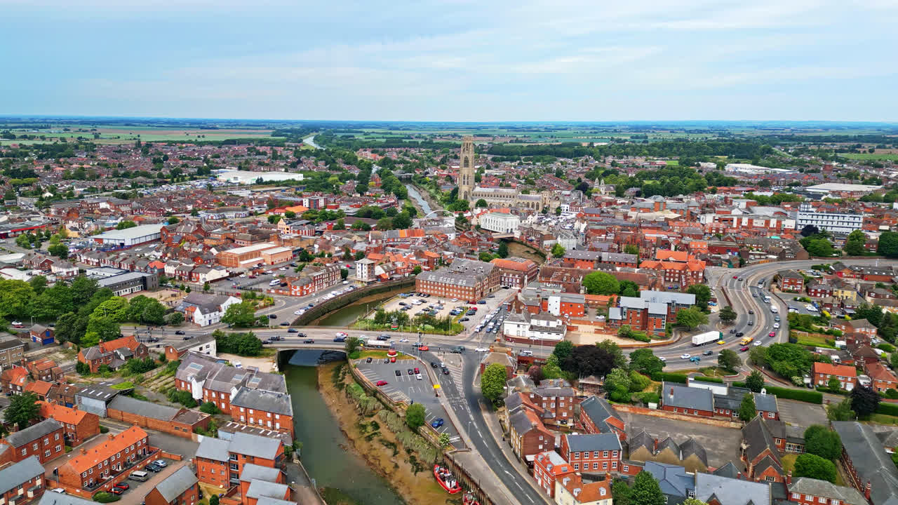 scenic beauty of Boston, Lincolnshire, in mesmerizing aerial drone footage: Port, ships, Saint Botolph Church , Saint Botolph's Bridge
