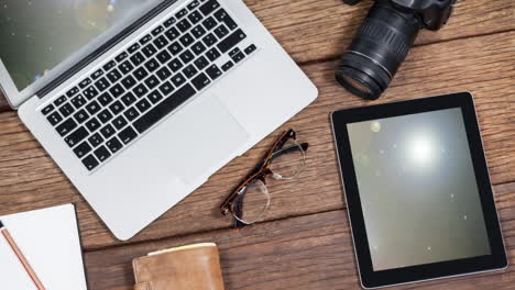 animation of a laptop and a digital tablet showing black screen