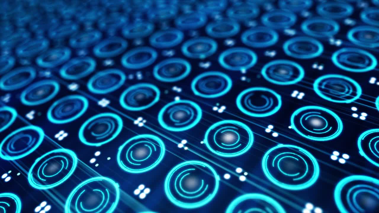 Pattern of small blue spinning circles and pixels moving on a electronic screen. Close-up of rotating neon circles