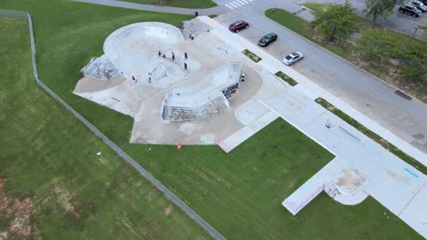 drone flying away from the skate park at heritage park