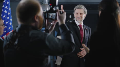 press conference or interview with a politician