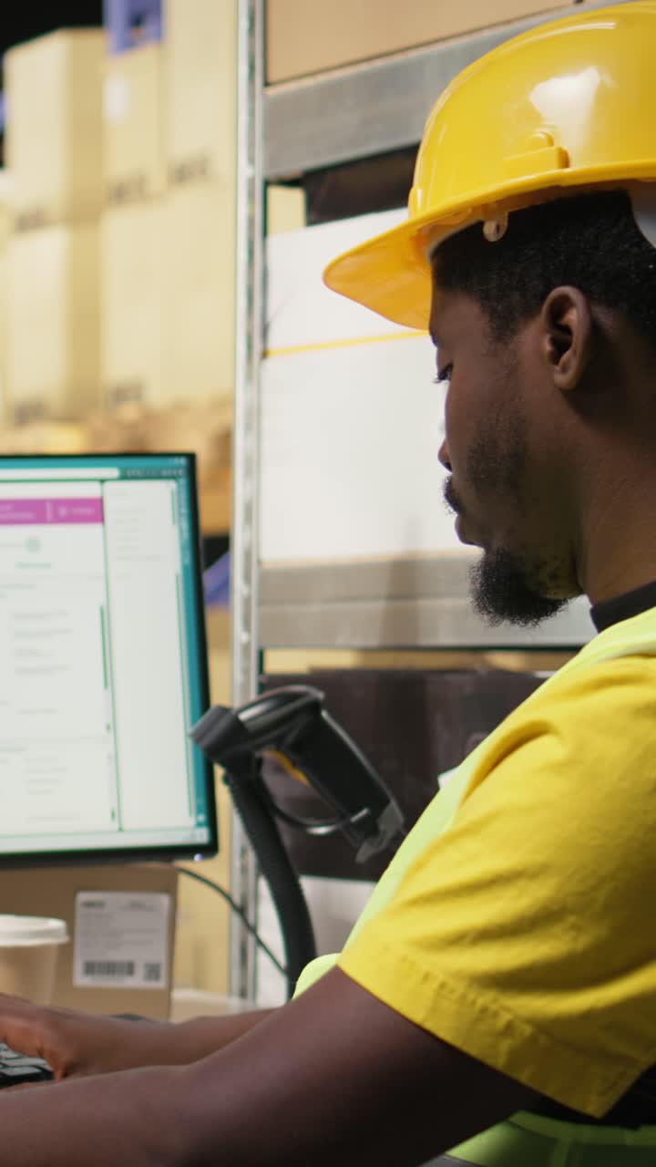 Vertical Video Black warehouse staff verifying cargo goods during import export process