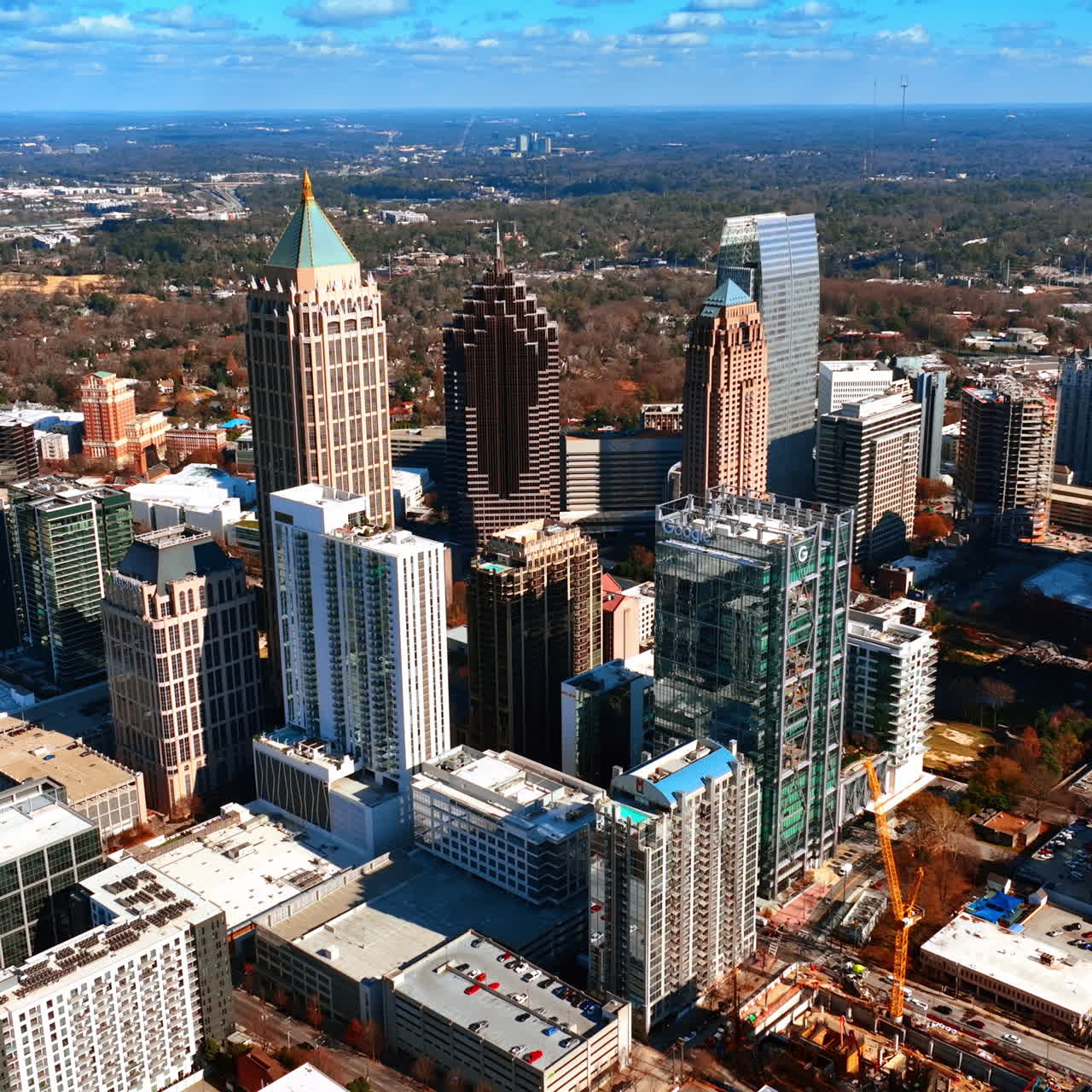 Beautiful skyscrapers in the city downtown. Aerial view on the high-rise buildings on sunny weather.