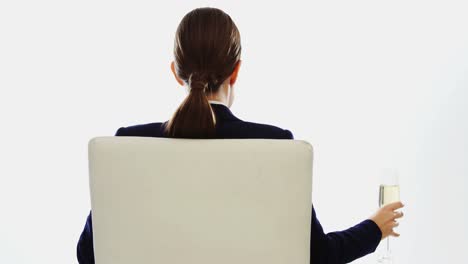 businesswoman having a glass of wine