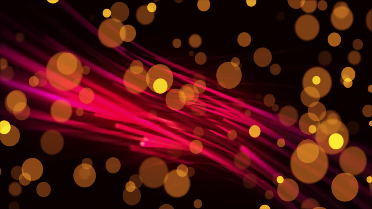 Animation of yellow spots and red trails on black background