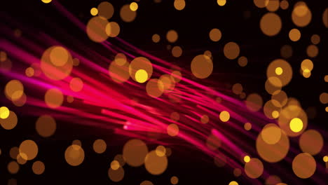 animation of yellow spots and red trails on black background