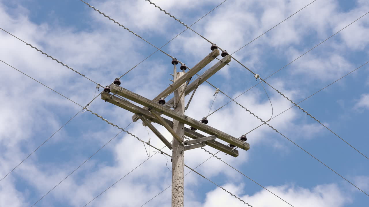 Clouds Moving Across The Sky Behind Telegraph Telephone Pole Timelapse
