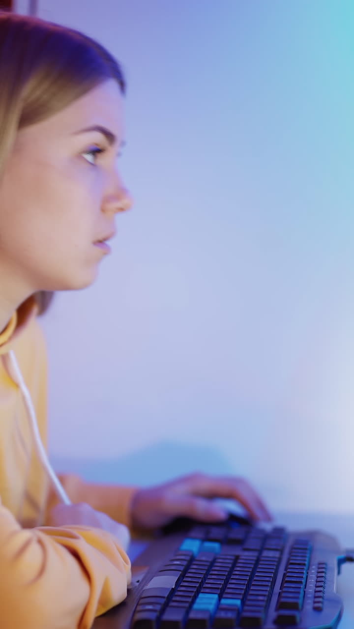 Girl using computer. Young beautiful girl using computer to look up information on the internet