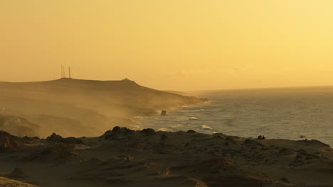 sunset coastal landscape with sand dunes