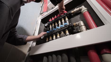 hvac technician installs heating, ventilation and air conditioning systems