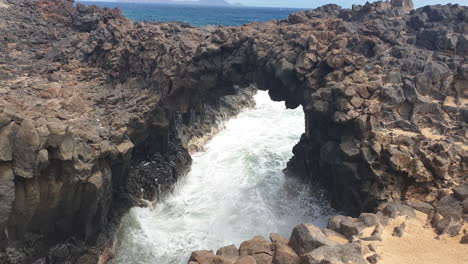 fantastic panoramic shot of one of the caletones arches located on the island of la graciosa