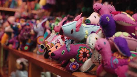 Colorful-Hand-Made-Soft-Toys-On-Souk-In-San-Cristobal-de-Las-Casas-In-Chiapas,-Mexico