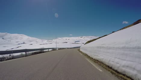 Driving-a-Car-on-a-Road-in-Norway