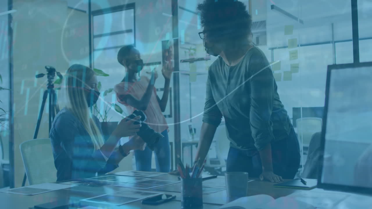 Animation of financial data processing over diverse business people in office