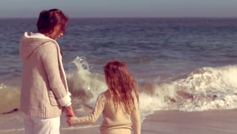 mother and daughter looking at the horizon