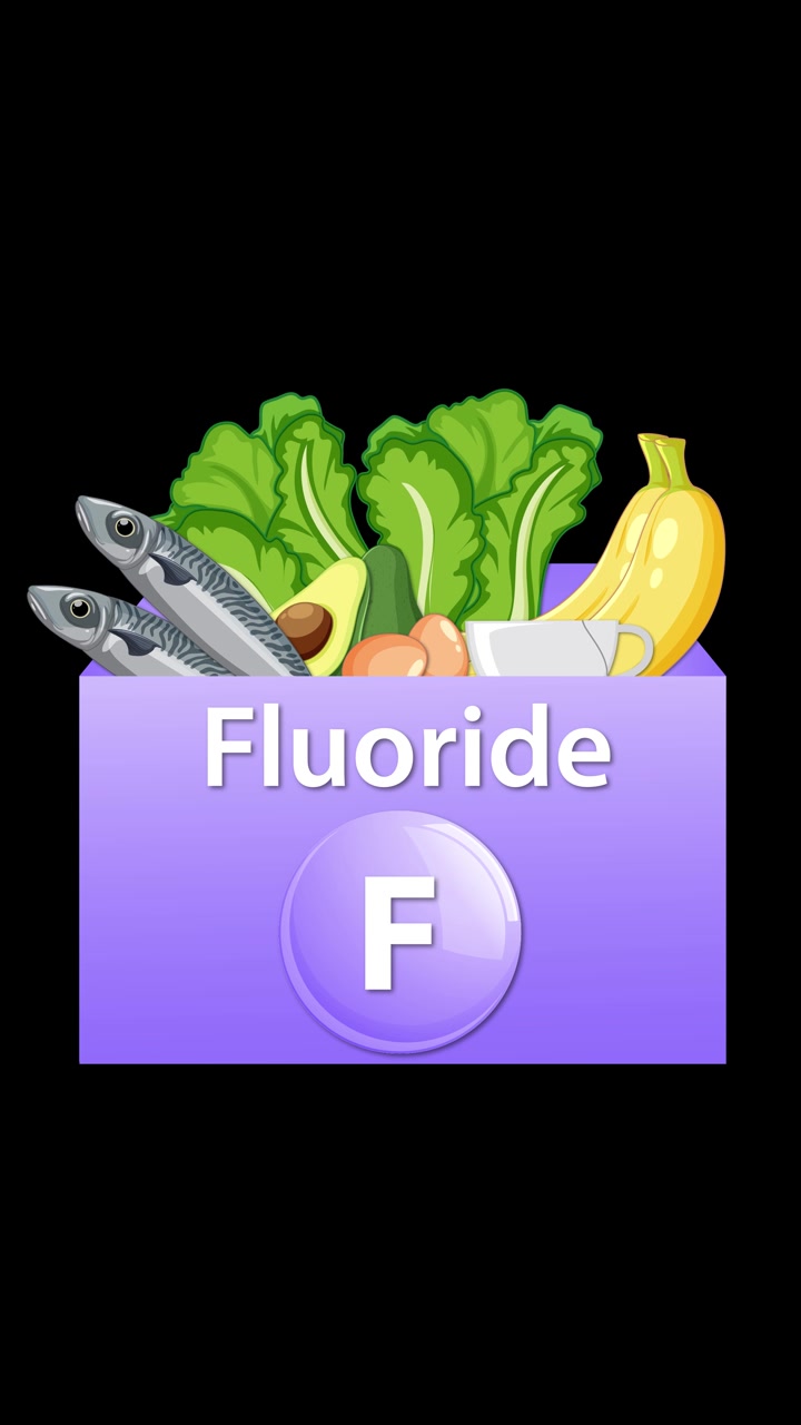Frutta, verdura e pesce colorati emergono da una scatola di fluoruro etichettata su sfondo nero.