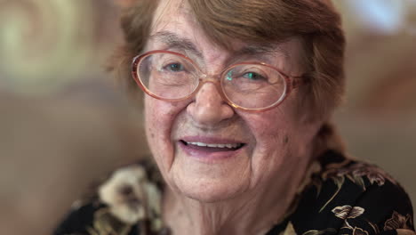 indoor portrait of happy elderly woman
