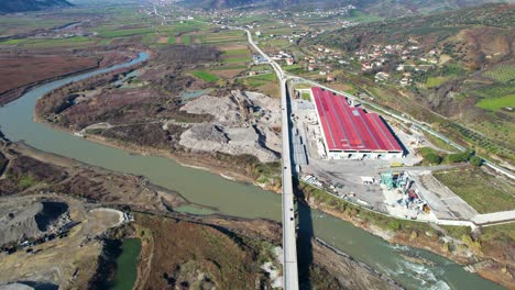 environmental disaster on riverbed damaged by sand quarry and dig on river banks in albania