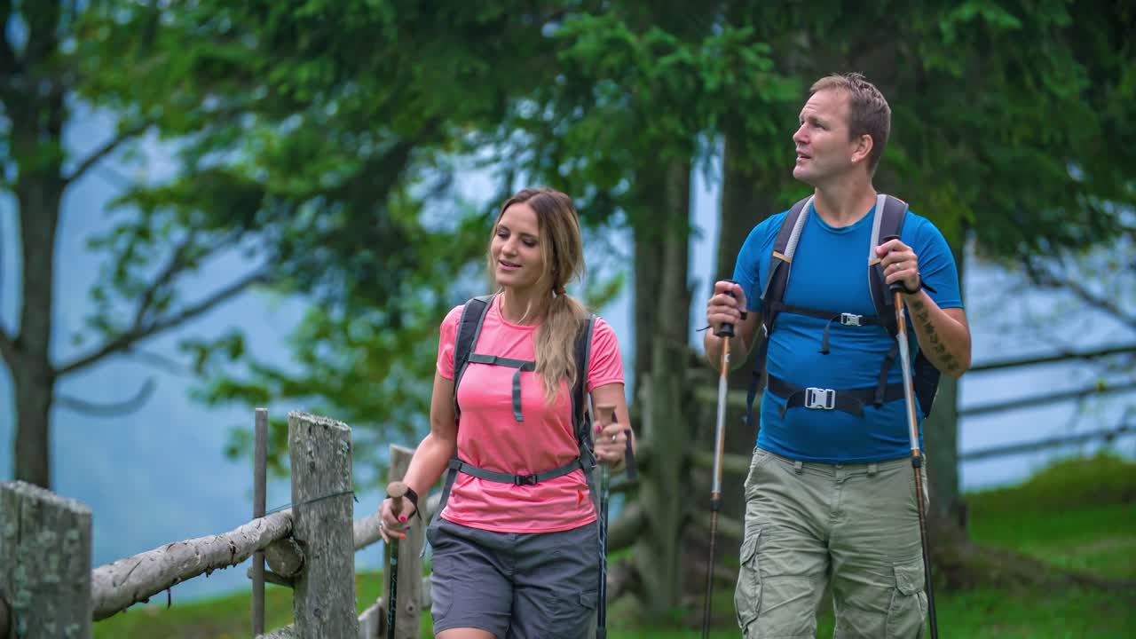 active and happy couple enjoying the view of Topla wonderful valley, Slovenia