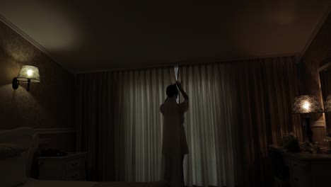 bride getting ready in her hotel room