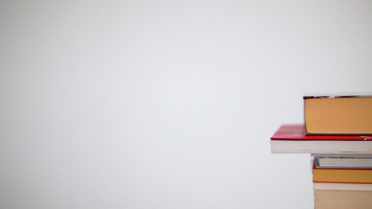 Smooth shot for books lying on the stack, from left to right