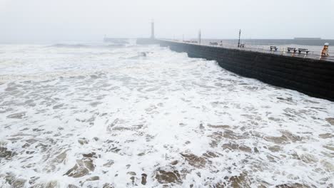 very mist and foggy scene on the coast of the uk