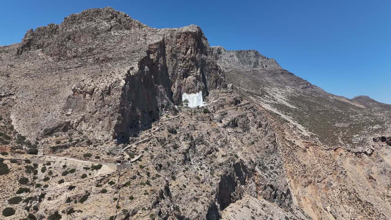 Monastery of Panagia Hozoviotissa carved in the mountain rock | Amorgos | 4k Drone shot