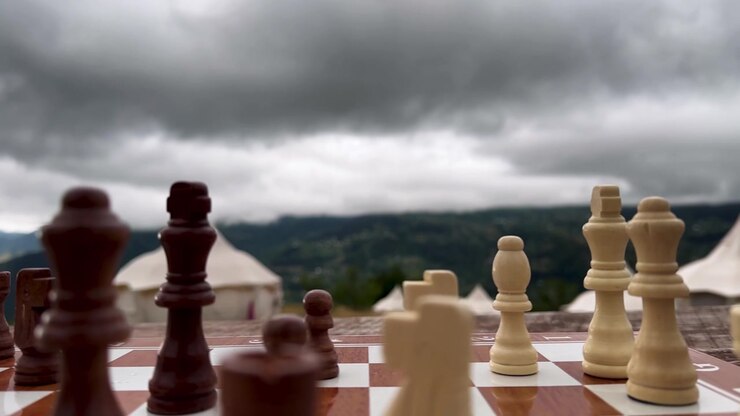 chess playing Cloudy sky and camping in campsite of wooden hut canvas tent Caucasus luxury travel highland Georgia mountain glamping outdoors adventure scenic nature retreat leisure vacation panoramic