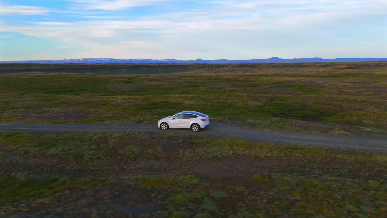 Witness the beauty of solitude as a home stands resilient on Iceland’s aged lava fields from above.