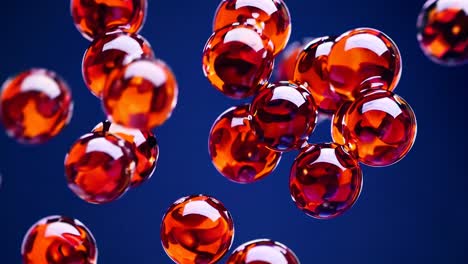 close-up video of glossy red spheres against a deep blue background, showcasing a dynamic