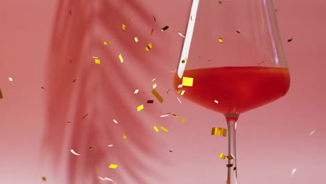 animación de confeti cayendo y cóctel sobre fondo rosa