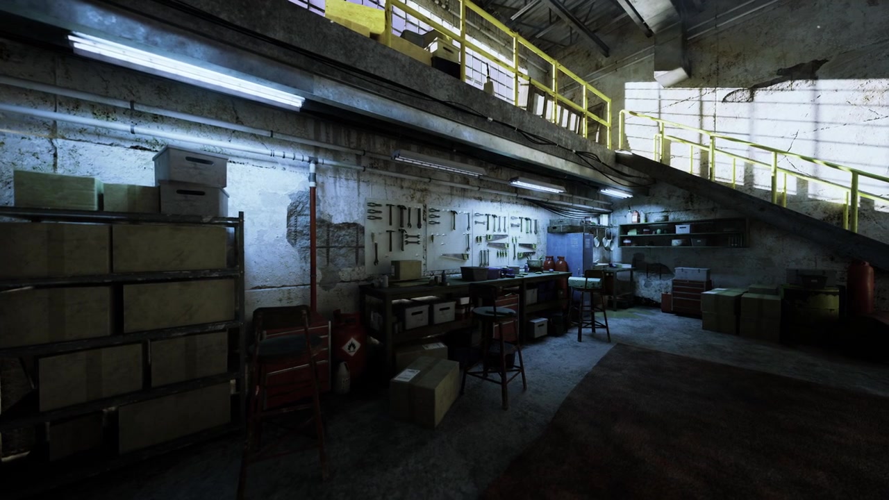 Factory setting illuminated by overhead lighting with multiple work zones