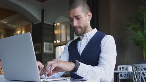 Young professional man in a cafe