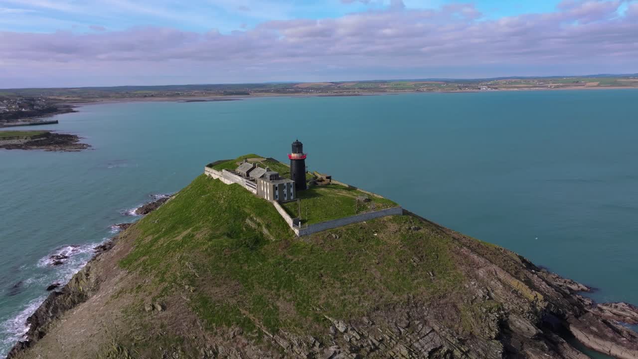 4K Cinematic Drone shot of the black Ballycotton Lighthouse overlooking the Atlantic Ocean, a symbol of Ireland’s maritime heritage Co.Cork - Ireland_15