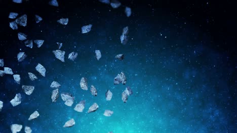volando muchos asteroides en el fondo del espacio profundo. explosión de salpicaduras rotas. el cielo estrellado. animación 3d de meteoritos girando. animación de bucle.