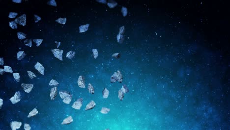 flying many asteroids in deep space background. broken splash explosion. the starry sky. 3d animation of meteorites rotating. loop animation.