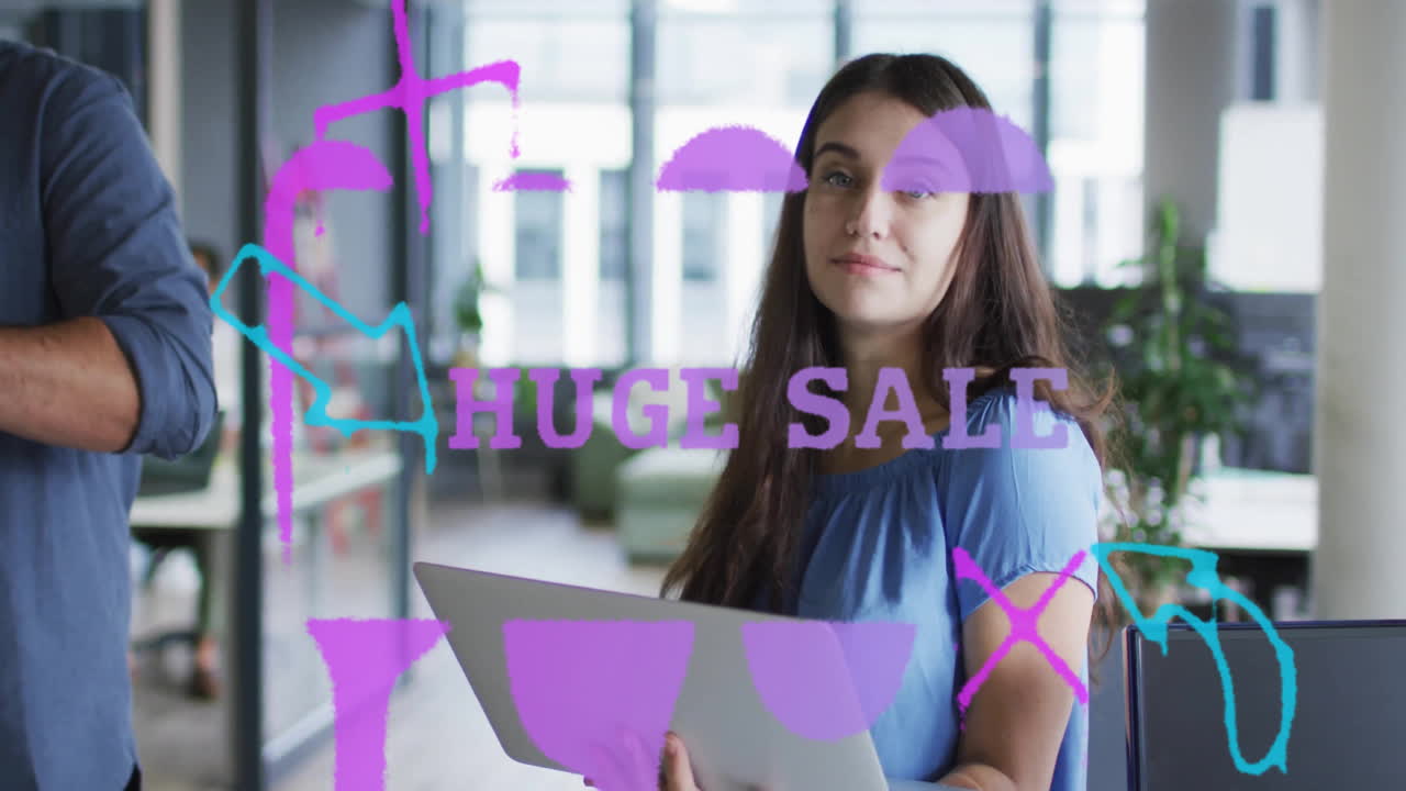 Holding laptop with animation, woman showcasing Huge Sale text and colorful graphics