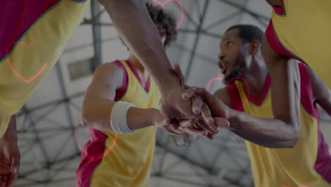 animation of hearts over diverse basketball players on court