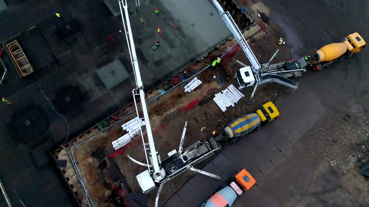 Aerial View of Concrete Pouring at a Construction Site