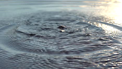 Slow-motion-footage-of-splashes-on-water-surface