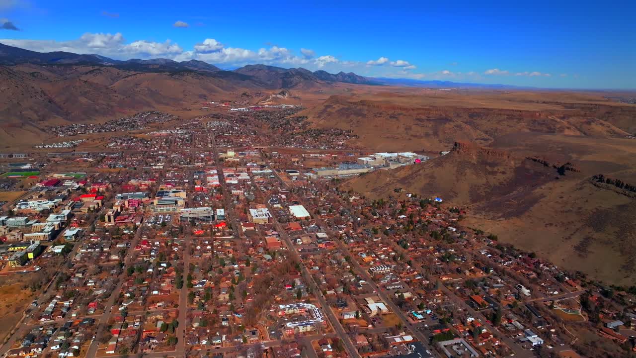 Golden Colorado aerial drone Colorado historic downtown Golden Gate Canyon winter sunny morning afternoon blue sky Boulder Flat Irons Clear Creek Lookout Mountain Coors Beer Factory down motion