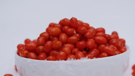 goji berries in a snow-covered bowl