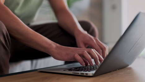 person working on a laptop at home